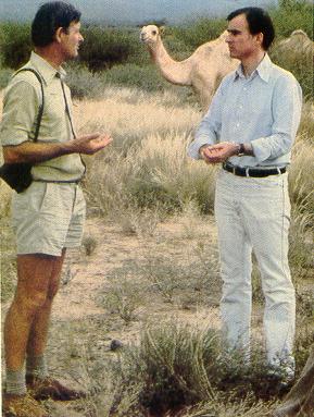 Brown discussing irrigation and Ronstadt
taking photos in Kenya